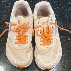 Altra Beige Running Shoes with Orange Accents